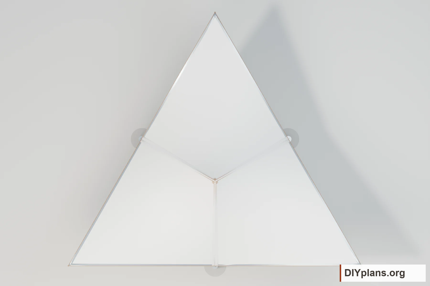 Top view of a triangular membrane roof divided into three panels around a central crown.